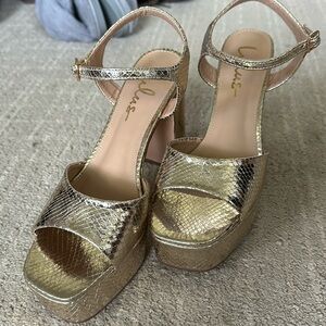 Gold snake embossed platform heels, worn once
